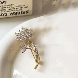 Vintage crystal flower brooch elegant alloy lapel pin chic anti-glare clothing accessory.