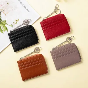Portable slim women's leather card holder with keychain available in four elegant colors