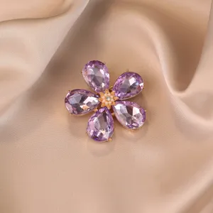 Exquisite purple crystal flower brooch detail, elegant alloy lapel pin for coats and sweaters.
