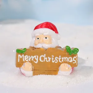 Santa Claus resin figurine holding Merry Christmas sign for micro landscapes