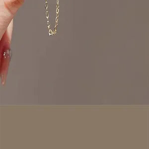 Delicate gold chain detail showcasing fine metal texture and sleek design for stylish jewelry.