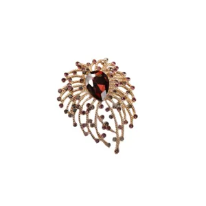 Vintage crystal brooch pin for women, elegant red teardrop rhinestone gold-tone coat jewelry.