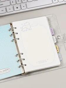 Vue détaillée d'un carnet A5 à feuilles mobiles avec des illustrations de chatons