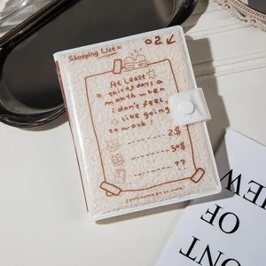 Schattig pluche notitieboekje met zachte hoes en drukknoop, perfect voor dagboek en notities.