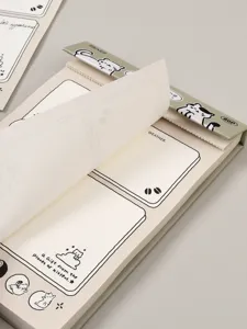 Blocs-notes B6 staccabile con illustrazioni di gatti e pagine a griglia per studenti.