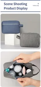 Innenansicht einer geräumigen grauen Kulturtasche mit Platz für Reiseutensilien
