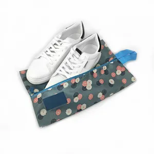 Waterproof travel shoe bag with floral pattern portable sneaker storage organizer case.