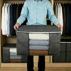 Scene detail of a large grey fabric quilt storage bag held in a wardrobe, keeping clothes neat.