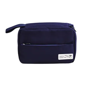 Dunkelblaue Reise Kulturtasche, tragbarer Kosmetik-Organizer mit Griff und Reißverschlusstasche.