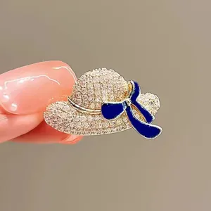 Rhinestone straw hat brooch with blue bow, exquisite lapel pin for suit collar accessory.