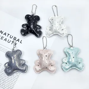 Five colorful cartoon bear pendants with studs and ball chains for bags