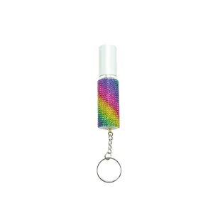 Detailed view of a portable 5ml rhinestone perfume atomizer keychain with colorful crystals