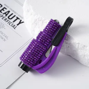 Detailed close-up of purple rhinestone car window breaker and seatbelt cutter tool