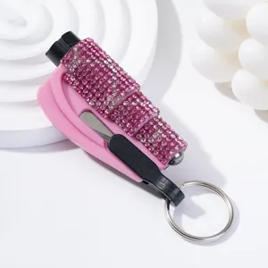 Close-up of the sparkling pink rhinestone car safety hammer featuring a keychain