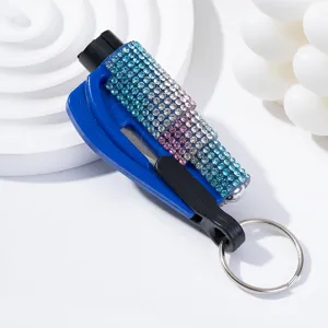 Detail view of blue rhinestone encrusted car window breaker with portable keychain