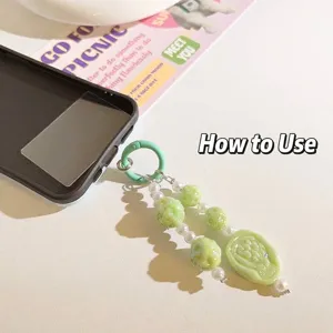 Groene kralen telefoonzakje met transparante verbindingslipje