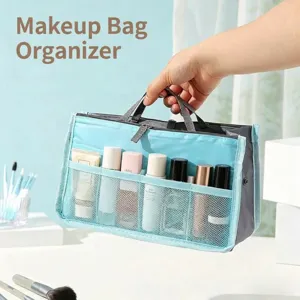 Detailed view of large capacity cosmetic organizer bag with mesh pockets and dual zippers.
