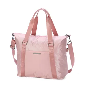 Pink travel duffel bag large capacity waterproof luggage tote for business trips and storage