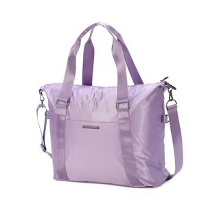 Large capacity purple travel bag, waterproof luggage storage bag with dual straps.