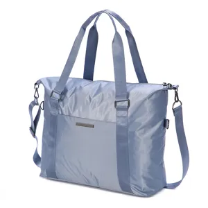 Large capacity blue travel duffel bag detail, portable waterproof luggage storage bag.