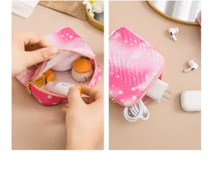 Detailed view of pink quilted multi-functional cosmetic and travel storage pouch for accessories.