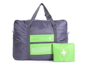 Portable folding travel luggage bag with large capacity, trolley sleeve and matching pouch.