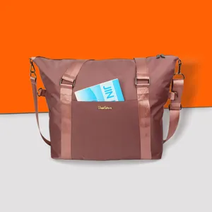 Waterproof travel duffel bag with shoulder strap, large capacity storage bag for luggage.