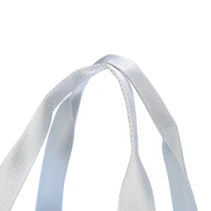 Macro view showing the durable high-density woven texture of the silver bag handle strap