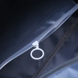 Waterproof wet separation pocket detail close up for travel duffel bag interior zipper pull