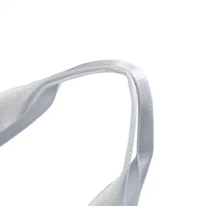 Close-up detail of durable woven luggage handle strap showing fine texture and quality.