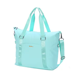 Detailed front side view of lightweight large-capacity waterproof travel bag in mint green