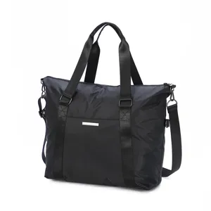 Close-up detail of the durable black travel bag, featuring strong handles and waterproof fabric.