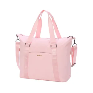 Lightweight pink large travel bag with waterproof material and metal fashion logo