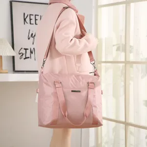 Large capacity travel duffel bag waterproof pink shoulder bag for women gym weekend luggage