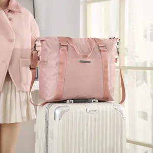Large capacity portable travel duffel bag waterproof luggage storage bag for business trips.