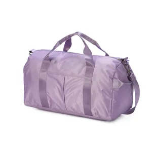 Purple travel duffel bag detail, large capacity gym bag with sturdy handles and shoulder strap.