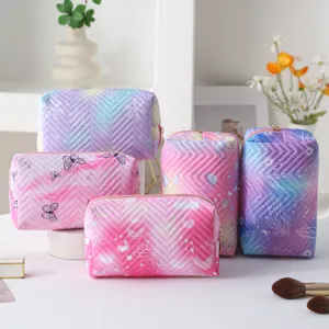Set of colorful quilted waterproof makeup pouches with gradient butterfly patterns