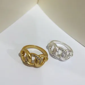 Eleganti anelli a nodo in ottone con cristalli scintillanti in oro e argento