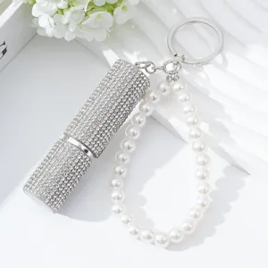 Detailed view of a silver 5ml rhinestone perfume atomizer with pearl bead keychain strap