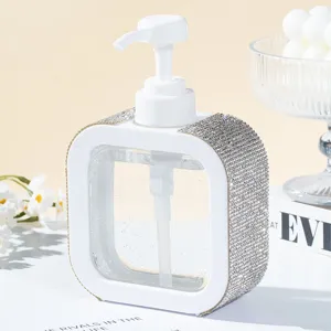 Macro view of luxury rhinestone-studded refillable white press soap dispenser bottle