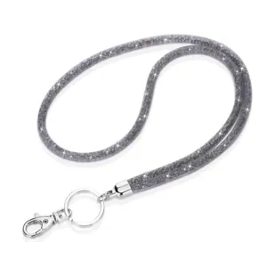 Close-up of elegant silver sparkly mesh lanyard with polished metal key ring and claw clasp