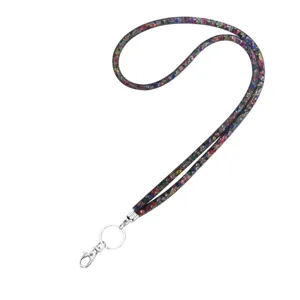 Detailed view of a multi-color rhinestone lanyard with fishnet mesh and metal clip
