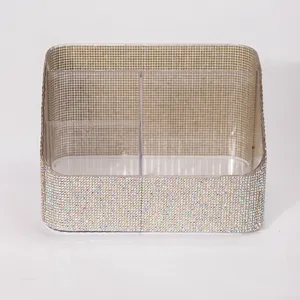 Detail shot of multi-compartment desktop organizer covered in iridescent rhinestones