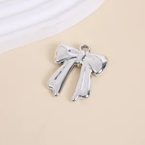 Silver metallic bow charm pendant with hanging loop for DIY jewelry making