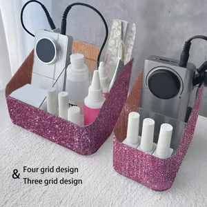 Close-up detail of pink rhinestone desk organizers featuring three and four grid storage designs