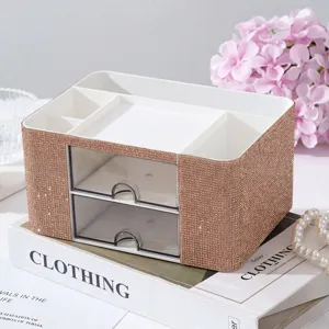 Detail of a sparkling rhinestone 2-drawer makeup organizer on a stylish white desk