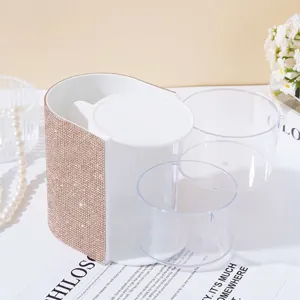 Detail of luxury rhinestone makeup organizer box with rotating acrylic drawers