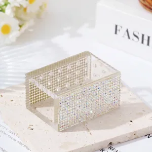 Detail of 18-hole acrylic nail drill bit storage box with shiny rhinestone decor