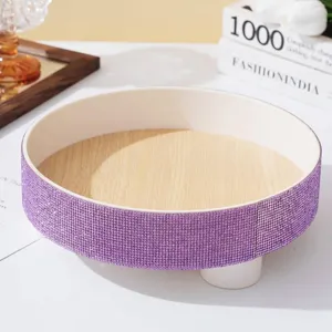 Detail view of luxury round purple rhinestone tray for skincare and cosmetic organization