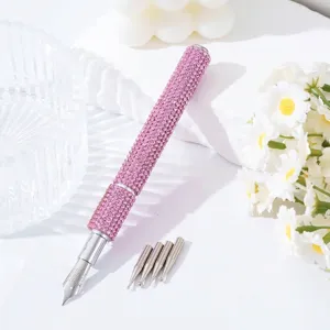 Detail view of rhinestone nail art pen with five interchangeable metal tips